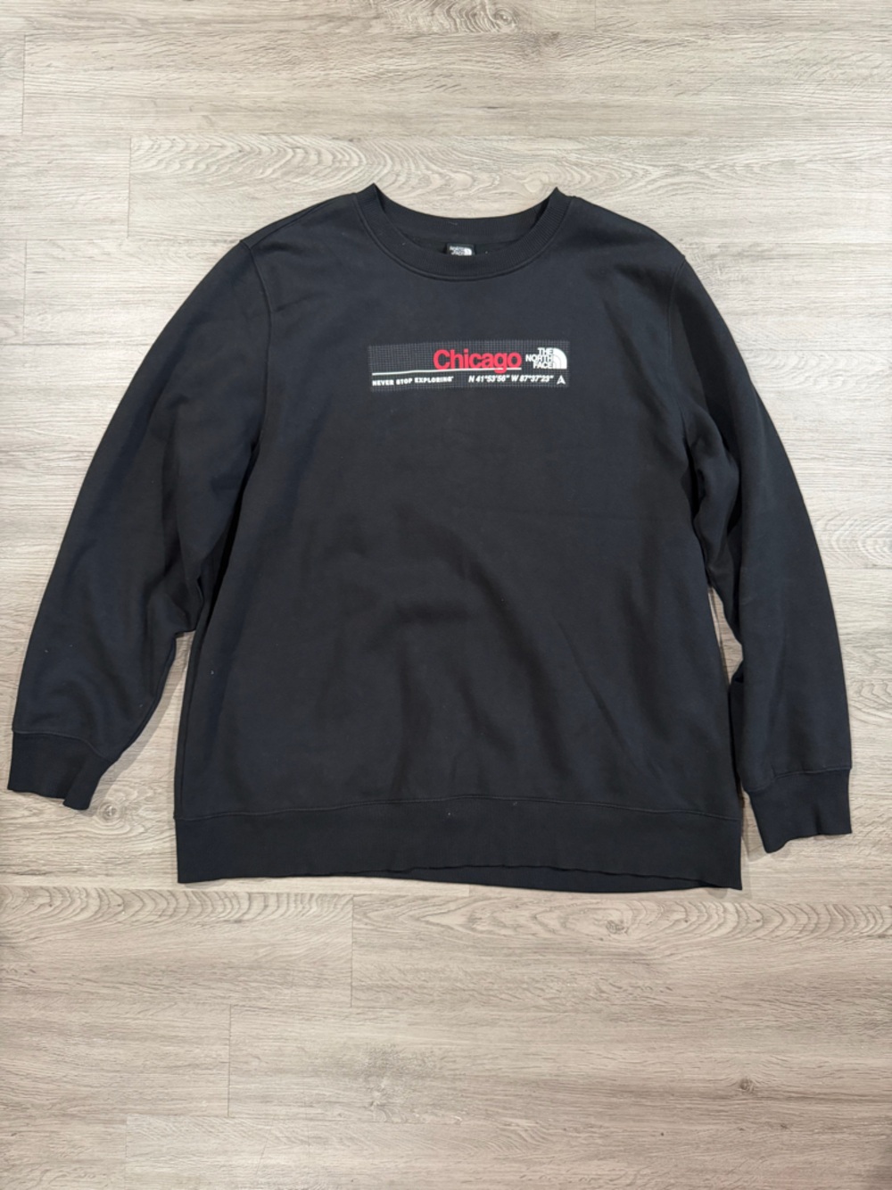 The North Face Men's Black Crewneck Sweatshirt with Red Chicago Graphic